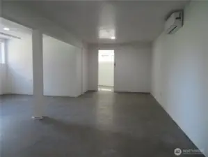 Living room and straight ahead is the mechanical room.