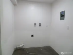 Laundry space for lower level.