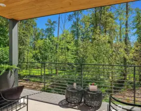 Covered outdoor living with beautiful views of the nature preserve