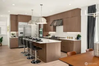 Chefs kitchen with Subzeo fridge, 6 burner JennAir range,  upgraded cabinets and quartz countertops