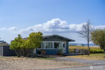 Sweet 2 bedroom, 3/4 bath cottage with lots of light and easy living.