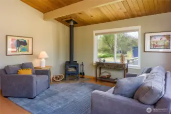 Vaulted ceilings, fir floors and a wood stove to keep you cozy.