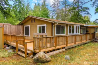Nestled on an acre of land, this home offers privacy and a rural feeling, while still being convenient to all amenities.
