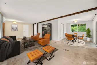 Virtually staged living and dining rooms.