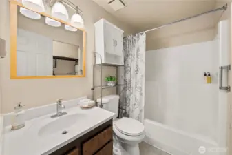 Full bath located in the hall near Bedrooms #2 and #3.