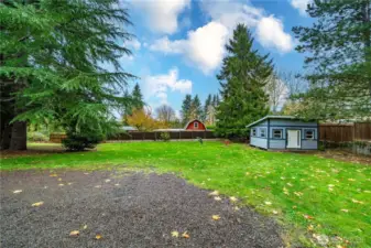 Outside the home, the spacious and level lot is ideal for any gardener: raised beds, a water feature . . . bring your dreams! There’s room for lawn games or just chilling by the firepit with a beverage under the stars at dusk. Loads of parking too —boat, RV, all your toys will have a space