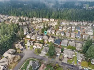 Low maintenance fans, this one’s for you. The fully fenced backyard skips the grass in favor of an expansive paver patio, creating usable outdoor space without the upkeep. A slight slope leads to the fence line, keeping things practical and polished. It’s private, clean, and designed for relaxing, not landscaping.
