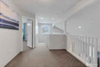 The open loft creates an elevated extension of the home’s living space—ideal as a private media lounge, executive workspace, or quiet retreat. Overlooking the main level, it enhances the architectural flow while offering versatility for today’s dynamic lifestyle.