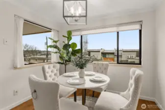 Dining area with Lake Union views—perfect for meals or entertaining!