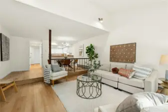 Living area with vaulted ceilings.