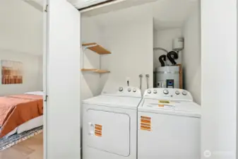 Upstairs laundry with brand new washer and dryer.