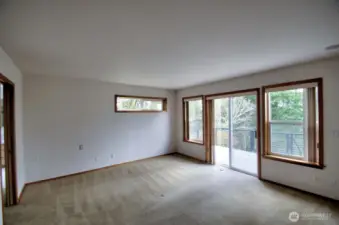 Primary suite with slider access to the updated deck and gorgeous view.  Spacious bedroom.