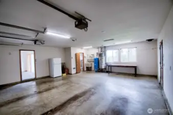 Double car garage with workbench.