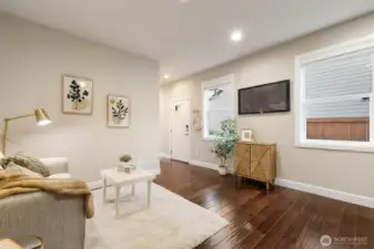 Step around the corner to find a 3/4 bathroom, laundry, and bedroom