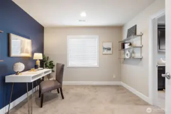 Upstairs office area with French doors