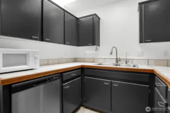 stainless steel appliances, sleek cabinets.