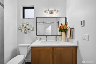 Elegant owner's suite bathroom with double sink heads.