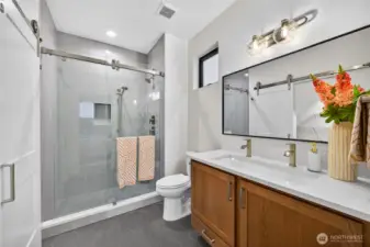 Owner's suite bathroom has full time shower and floors, Plenty of storage with vanity cabinet and large closet.