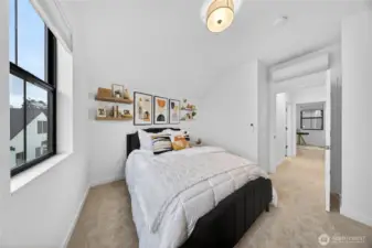 Additional view of one of the upstairs bedroom looking out towards the hall to full bath and second upstairs room.
