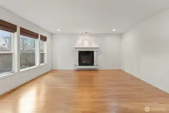 Relax in the cozy living room centered around a gas fireplace.