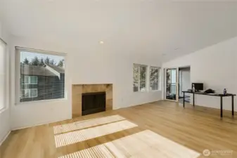 Open-concept living designed for comfort and flow. Sliders lead to a private deck.