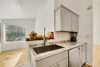 The kitchen is open to the dining area for easy entertaining.