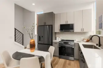 The kitchen that makes cooking feel like a treat. Matte black appliances, sleek cabinets, and an innovative layout = are all the motivation to try that new recipe finally.