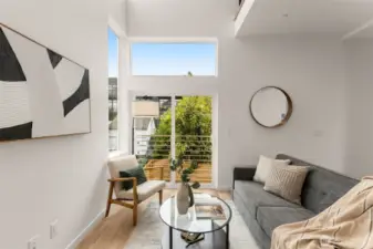 This space awaits you with double-height ceilings and floor-to-ceiling windows.