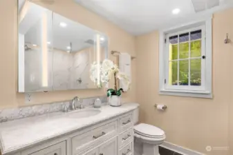 Beautiful finishes in this lower bathroom. You must see it in person to fully appreciate!