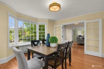 French doors greet you as you enter this charming dining room.
