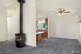 Looking from the living area toward the kitchen and dining area.