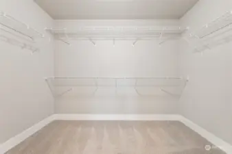 Amazing big primary suite walk-in closet.