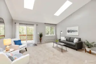 Great room with skylights and vaulted ceiling