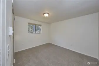 Large secondary bedroom #1 with new carpet and a blank slate for your creative mind to decorate