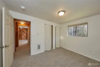 Dual bi-fold doors to access the spacious closet