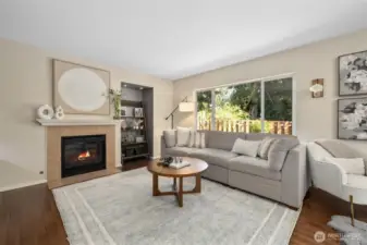 Spacious primary bedroom features a beautifully updated en-suite bath and a custom-designed walk-in closet.