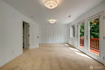 Primary Bedroom w/double doors to private deck