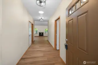 Roomy, light & bright foyer with new light fixture.