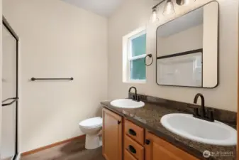 New matte black shower door & bath fixtures.