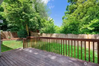 Spacious deck & private backyard.