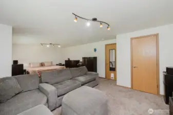 Massive bedroom upstairs.  Original home design were for a 4 bedroom house, so Sellers decided to make 2 bedrooms into one.  Walk-in closet and plenty of natural light from the eastern facing windows.