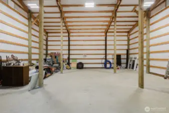 What will you do with this space??  Sellers had plans to create a loft space.  Plan renderings hanging on back wall.