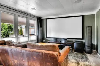 Spacious living room with built-in ceiling speakers, ready for your entertainment setup.
