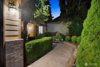 Covered front entry greets you to functional style and design