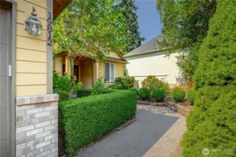 Covered front entry greets you to functional style and design