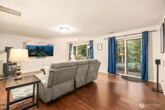 Perfect movie theater room. Attached TV and Sonos surround sound is negotiable. Slider to back patio and hot tub.