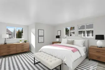 Spacious primary bedroom with ensuite bath in Everett townhome; upper-level privacy and natural light. virtually staged