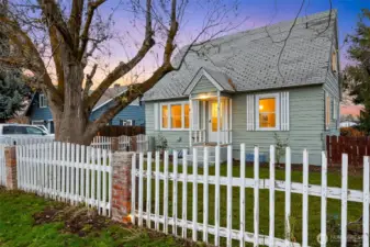 Fully fenced with underground sprinkler system front yard.