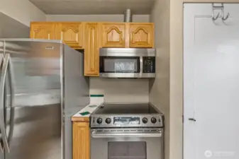 Conveniently located door to side yard and downstairs.