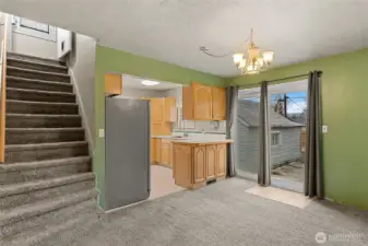 Stairs leading up to Master Bedroom with walk in closet.